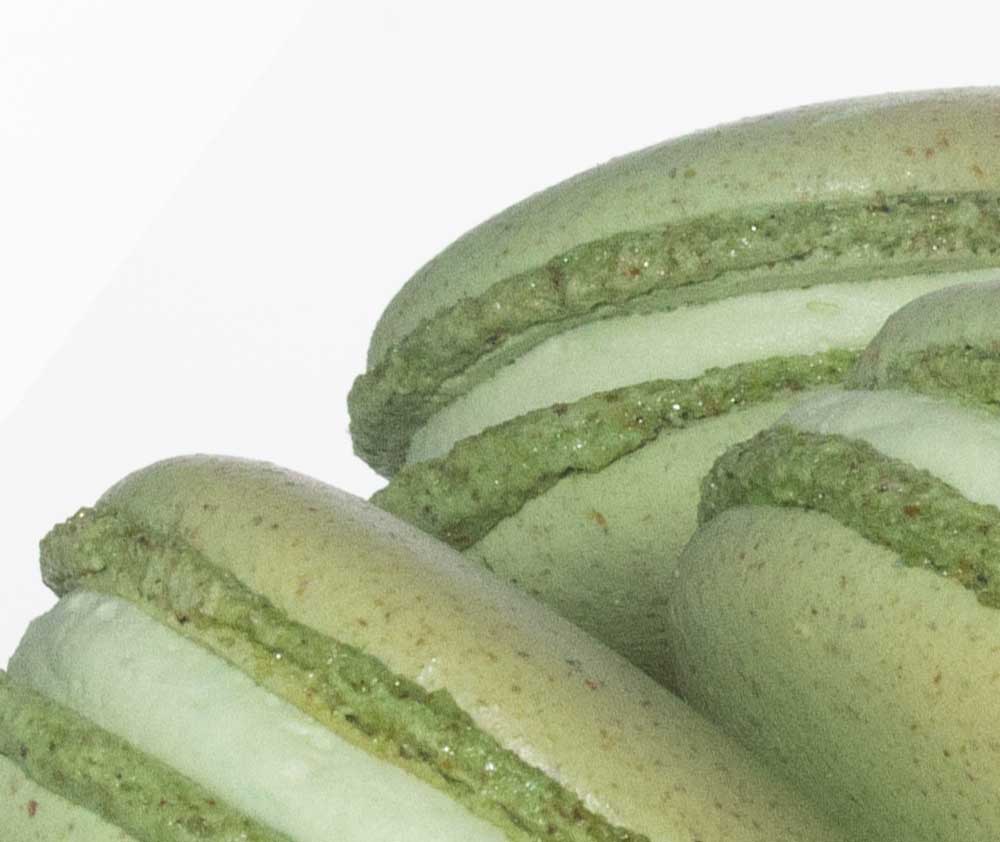 close up of pistachio green macarons