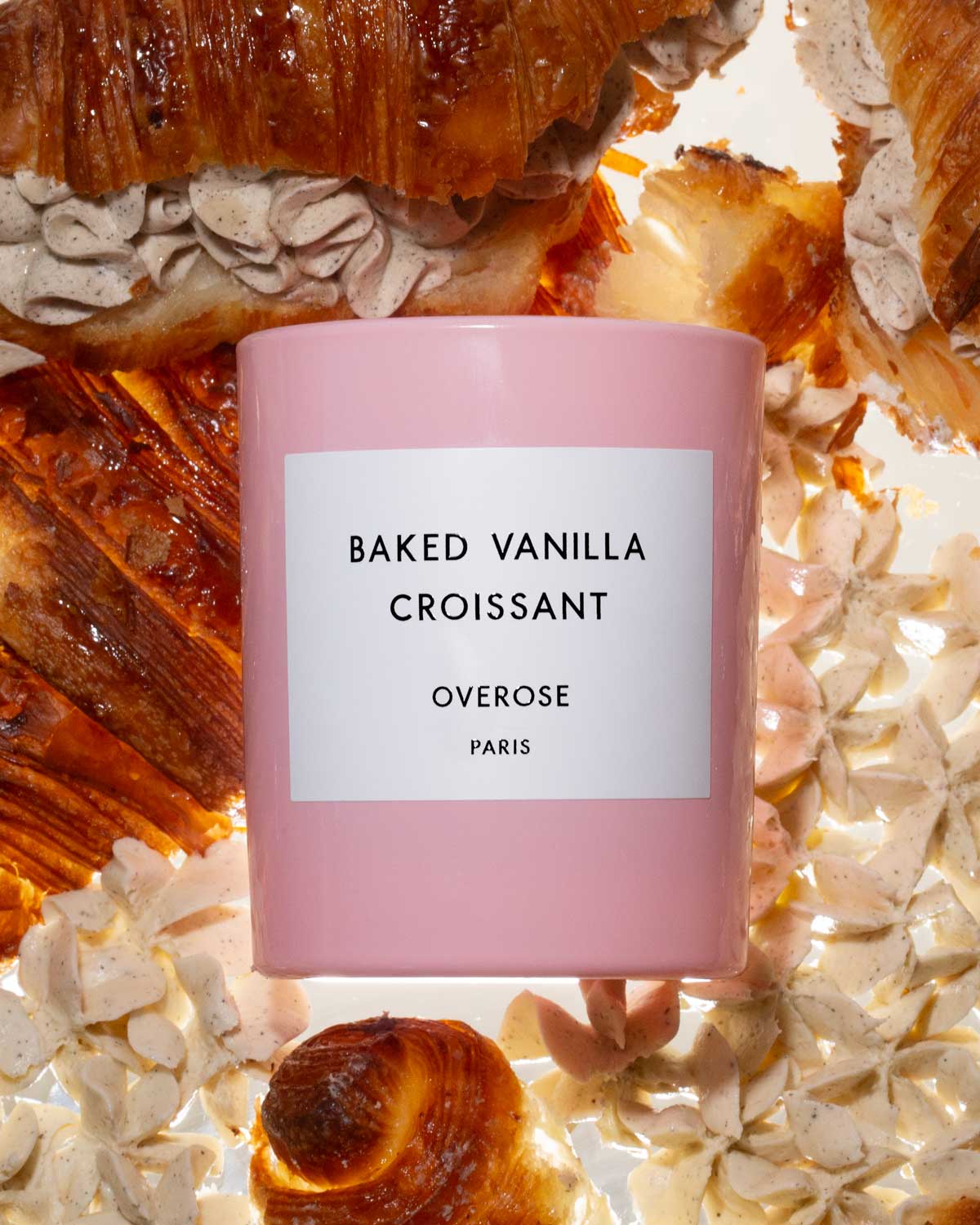 'Baked vanilla Croissant' candle in front of  vanilla croissants background
