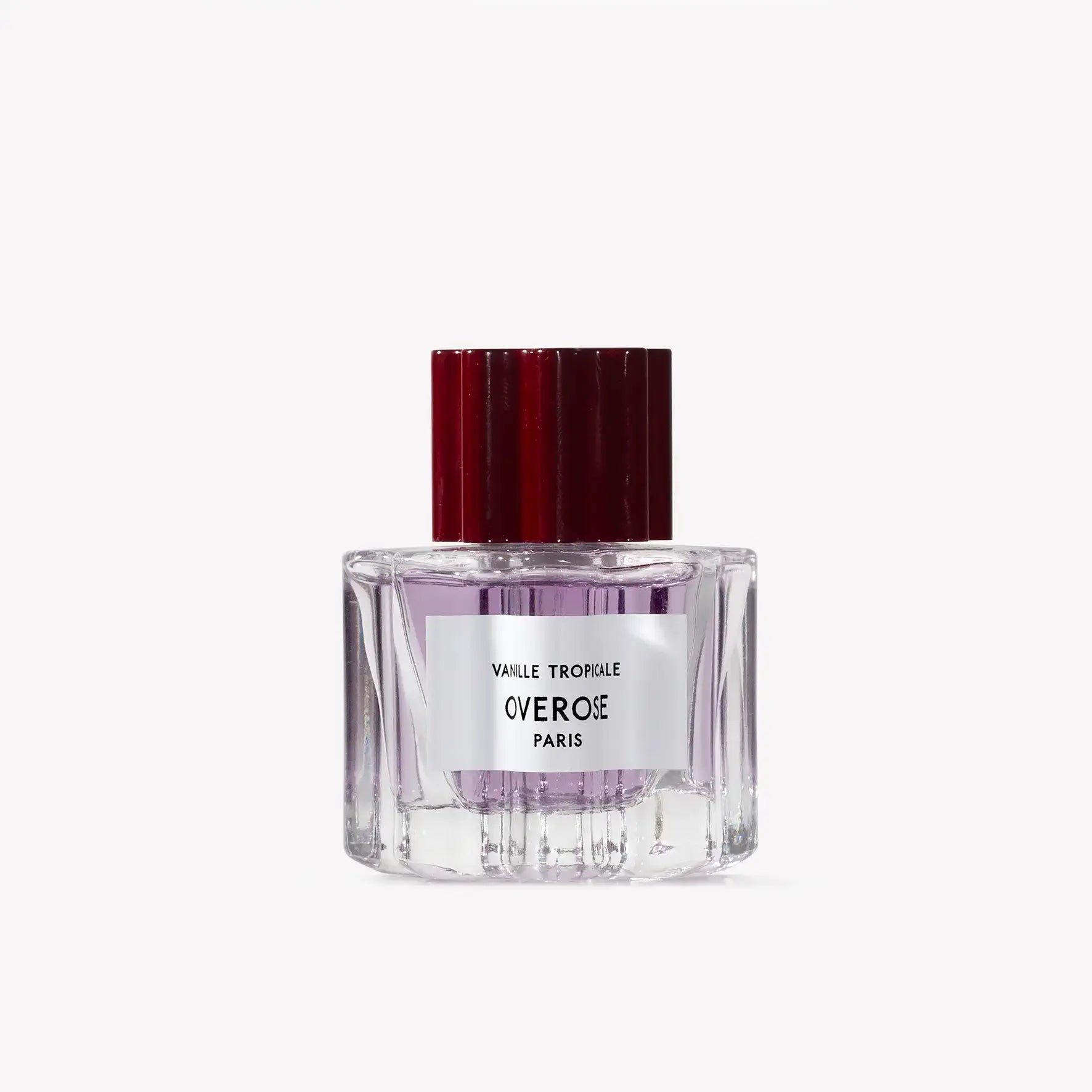 Perfume bottle with a red cap on a white background