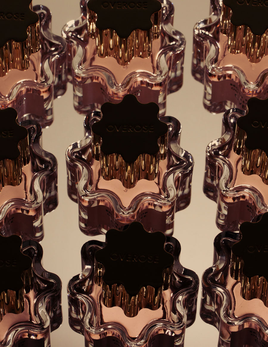 Multiple perfumes on dark background