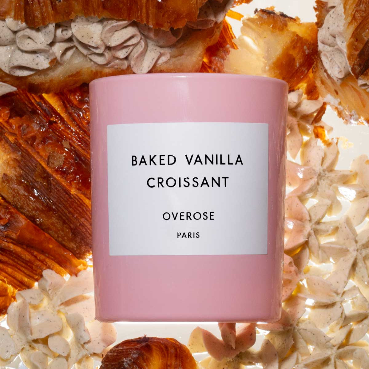 'Baked vanilla Croissant' candle in front of  vanilla croissants background