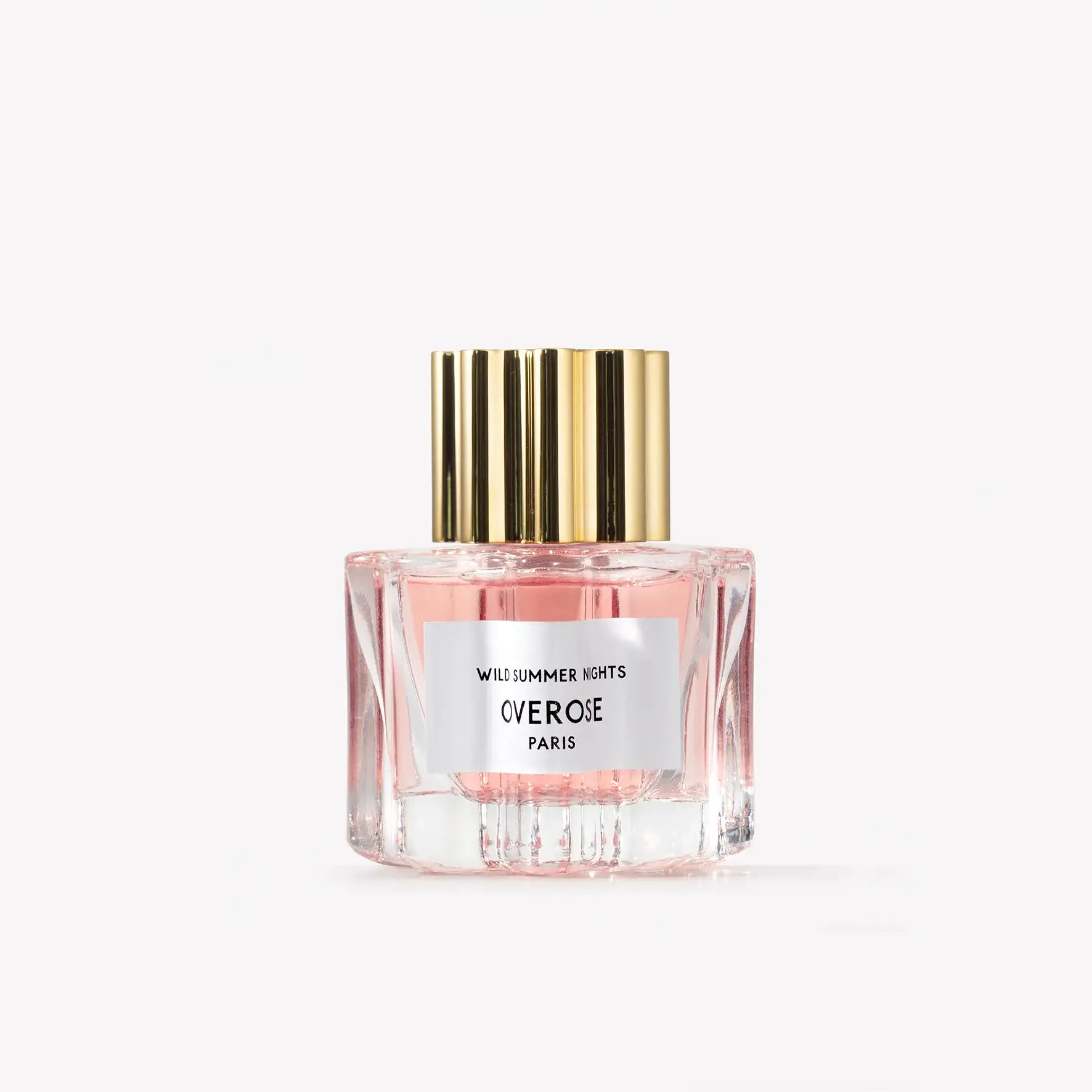 Perfume bottle with gold cap on a white background