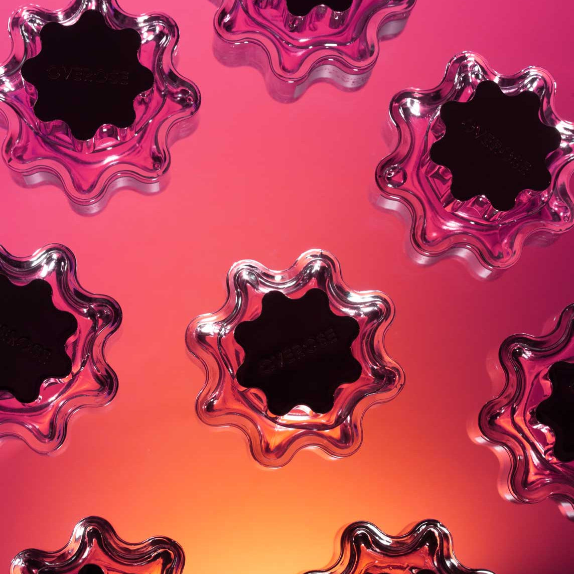 group of perfume bottles photographed from the top